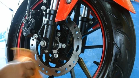 Wipe the motorcycle Stock Footage 109195591