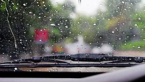 Wipe the rain on the windshield Stock Photos