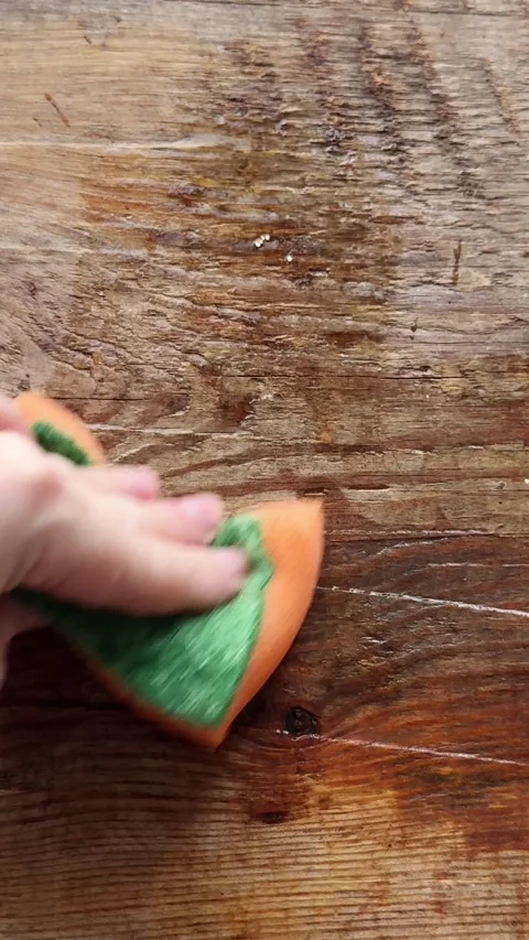 Wipe a wooden table with a sponge Stock Footage 328017658