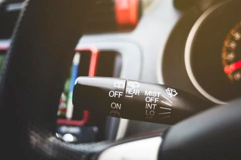 Wiper stick control switch with speed adjustment toggle switch. Stock Photos