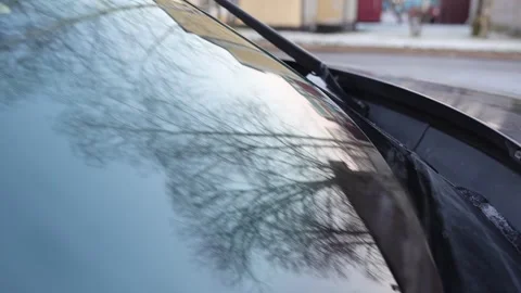 Wipers on the front window of the car Stock Footage 321418508