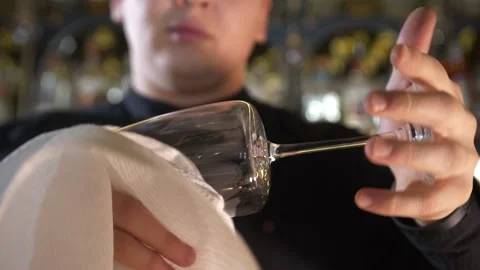 Wipes Glasses In The Restaurant. Stock Footage 168515936