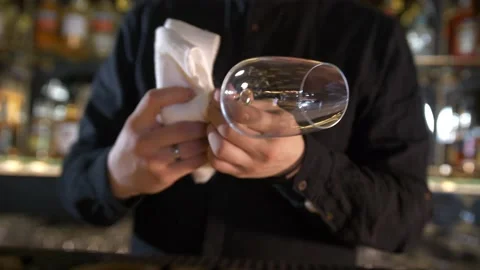 Wipes Glasses In The Restaurant. Stock Footage 168515963