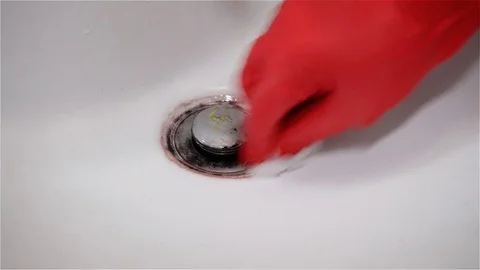 Wiping a basin with wet tissue Stock Footage 82512837