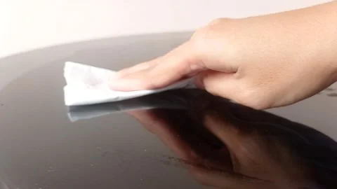 Wiping the dirt on the table with a tissue Stock Footage 150665872