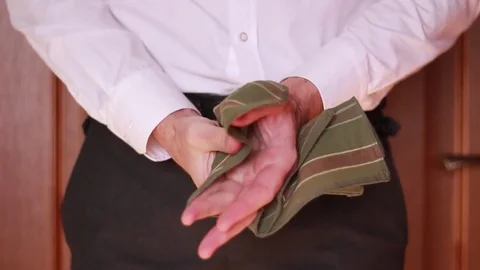 Wiping hands with handkerchief Stock Footage 84252877