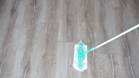 Wiping laminate flooring. Video stock 257503759