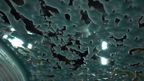 Wiping off snow foam from windscreen Stock Footage 93974958