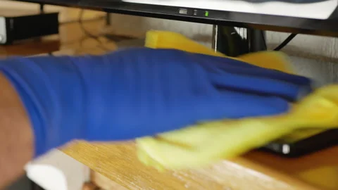 Wiping stand of the tv set. it stands on the oak desk Stock Footage 147604828