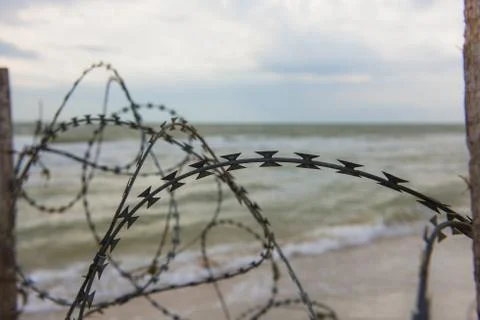 Wire on the beach Stock Photos