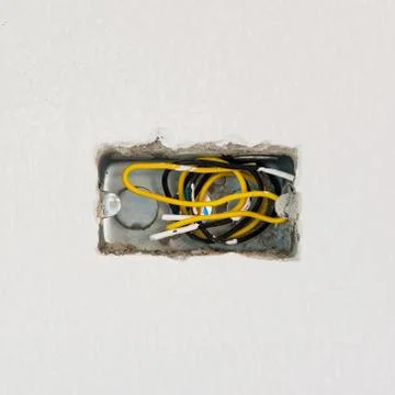 Wire box with different colored cables for power outlet installa Stock-Fotos
