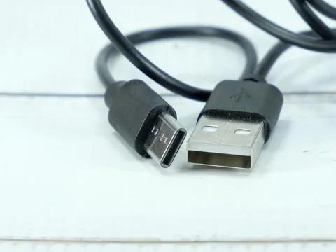 Wire cable of usb and adapter on blue background.Electronic Connector.Selec.. Foto stock