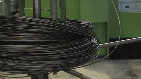 Wire in coils; merchant's quality wire, tie wire, rebar wire. Stock Footage 112018373