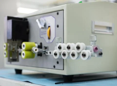 Wire cut and strip machine Stock Photos