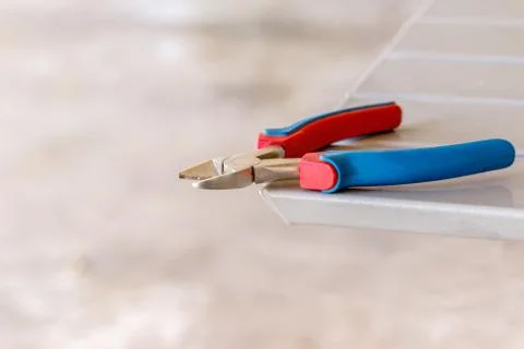 Wire cutters tools on table Stock Photos