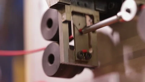 Wire cutting and stripping machine working - extreme close up Видео 139744893