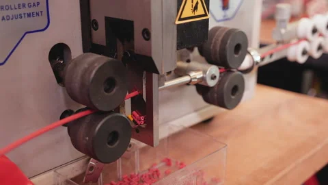 Wire cutting and stripping machine working - slow motion Video stock 141209222