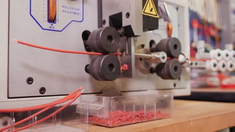 Wire cutting and stripping machine working - close up Stock Footage 141209836