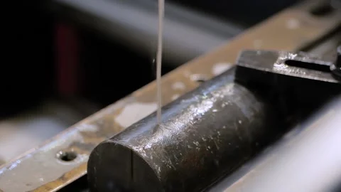 Wire cutting machine working with metal workpiece with sparks: slow motion Stock Footage 146067214