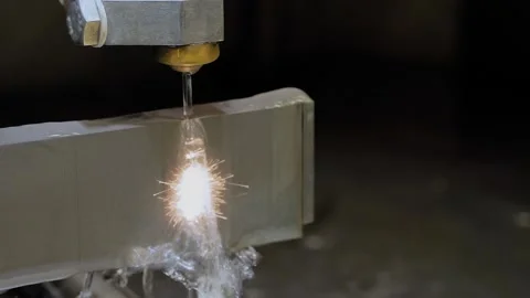Wire cutting machine working with metal workpiece with sparks at factory Stock Footage 167515679