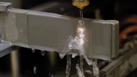 Wire cutting machine working with metal workpiece with sparks at factory Stock Footage 217414261