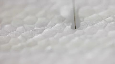 Wire decorating a slice of polystyrene. 스톡 동영상 36437670