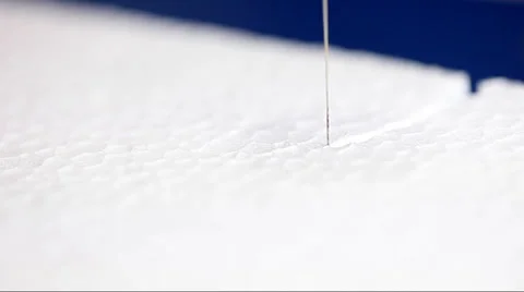 Wire decorating a slice of polystyrene. 스톡 동영상 36437849