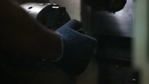 The Wire EDM machine cutting the gear shape of die insert. The mold and Stock Footage 150750016