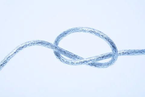 Wire fastened in the knot Stock Photos