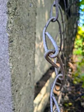 Wire fence. chain link mesh. rusty iron fence. old rusty cage. symbol of fr.. Stock Photos