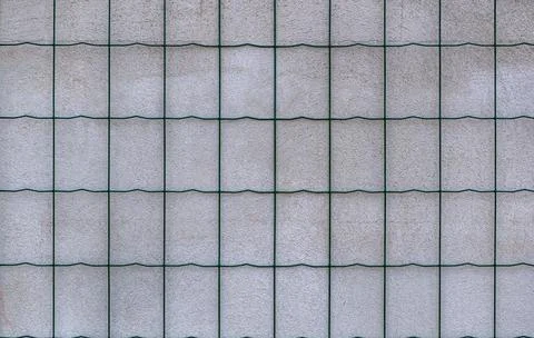 Wire fence reinforcing grid on the wall Stock Photos