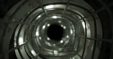 Wire frame tunnel, Wormhole corridor portal against black in 4K Video stock 153823119
