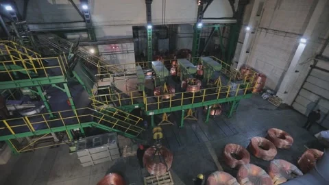 Wire manufacturing, continuous casting of copper wire rollers. General plan of Stock Footage 137732118
