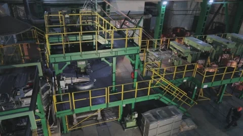 Wire manufacturing, continuous casting of copper wire rollers. General plan of Stock Footage 139276182