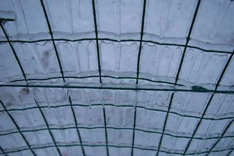 Wire mesh covered with ice Stock Photos