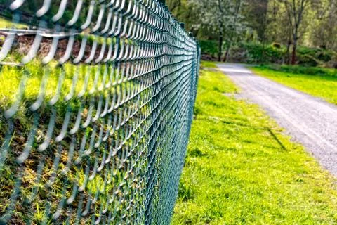 Wire mesh fence fenced plot 库存照片