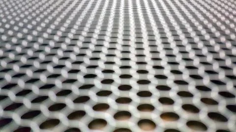 Wire mesh material texture background. Stock Photos