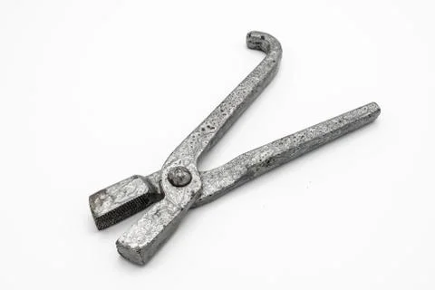 Wire pulling pliers lying on a white background Stock Photos