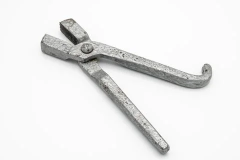Wire pulling pliers lying on a white background Stock Photos