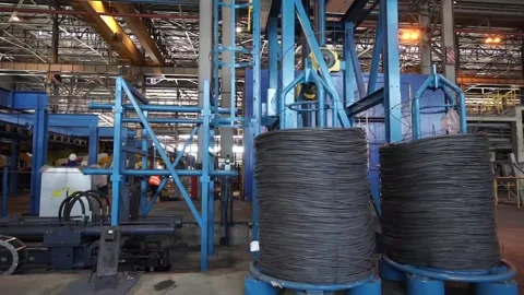 Wire rolling mill coil forming laying head at steel plant Stock Footage 89818881