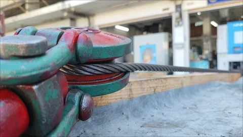 Wire rope or cable on rollers for dragging or pulling heavy objects. Stock Footage 294872718