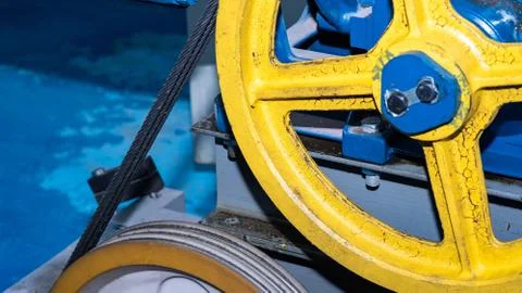 Wire rope in the sheave groove for lifting equipment Stock Photos