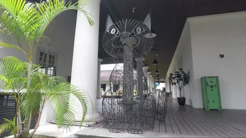 Wire sculpture of cat, Old Courthouse building, Kuching, Malaysia, Borneo Stock Footage 157179470