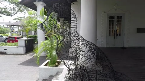 Wire sculpture of cat, Old Courthouse building, Kuching, Malaysia, Borneo Stock Footage 157315558