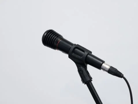 Wired black microphone on stand Фото