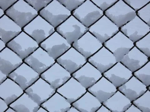 Wired Fence after Blizzard  Pattern Stock Photos