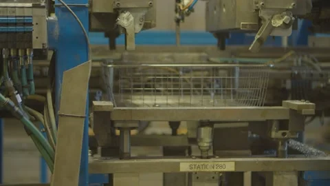 Wired mesh cages moving on the track in the factory Stock-Footage 152773919