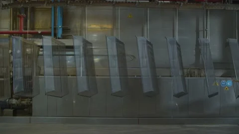 Wired mesh cages moving on the track in the factory Stock Footage 152782978