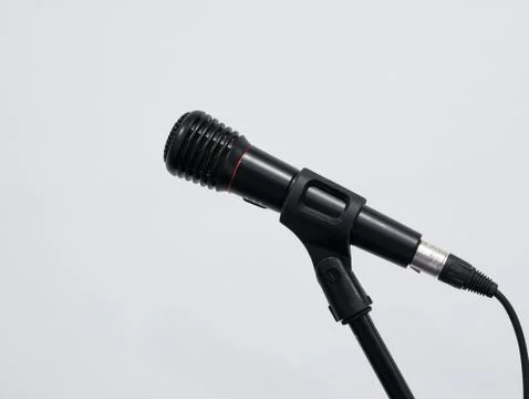 Wired microphone on stand at white background Stock Photos