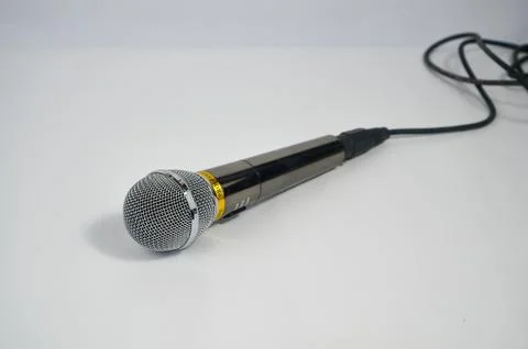 The wired microphone on a white background Stock Photos